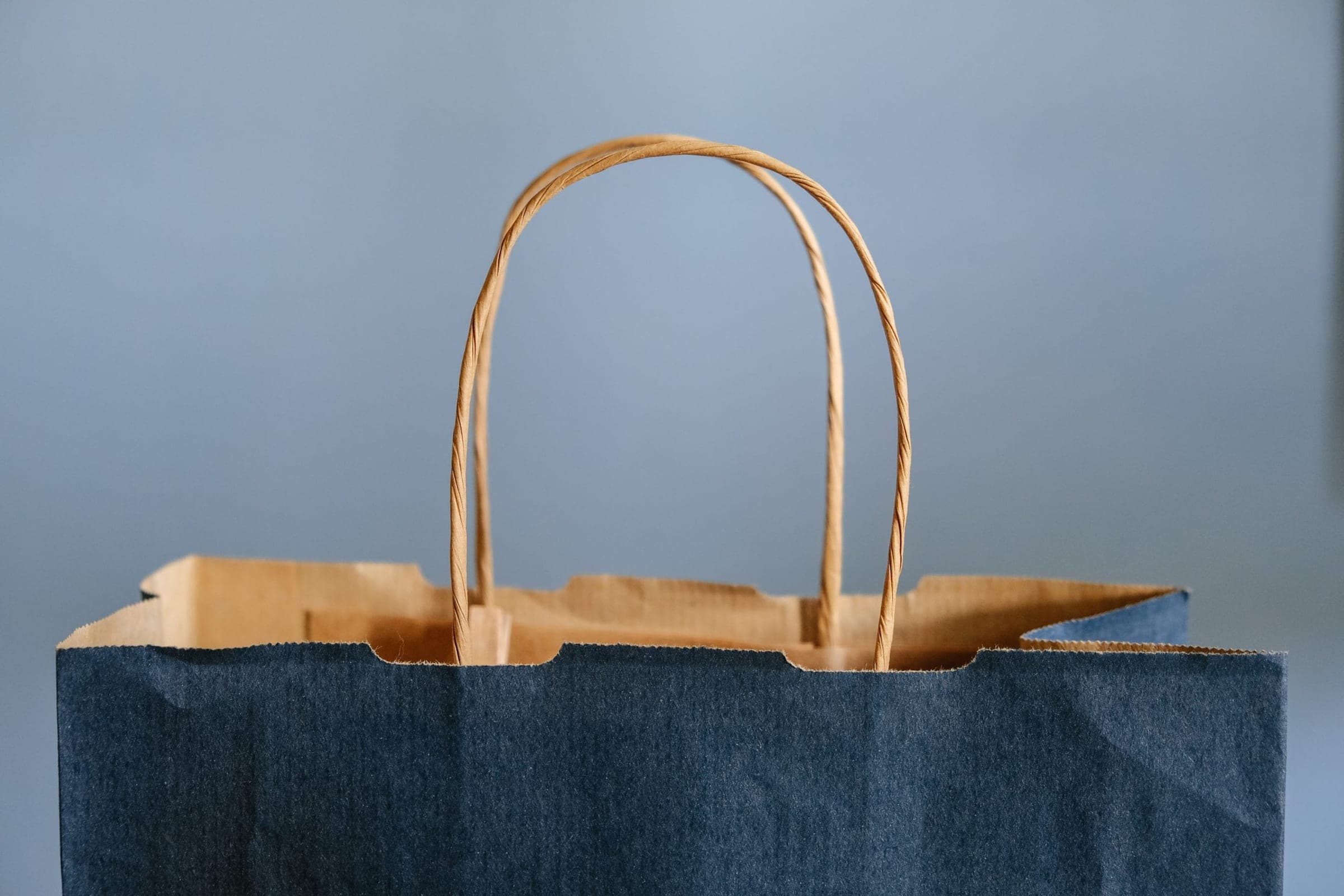 Close up shot of brown paper shopping bag