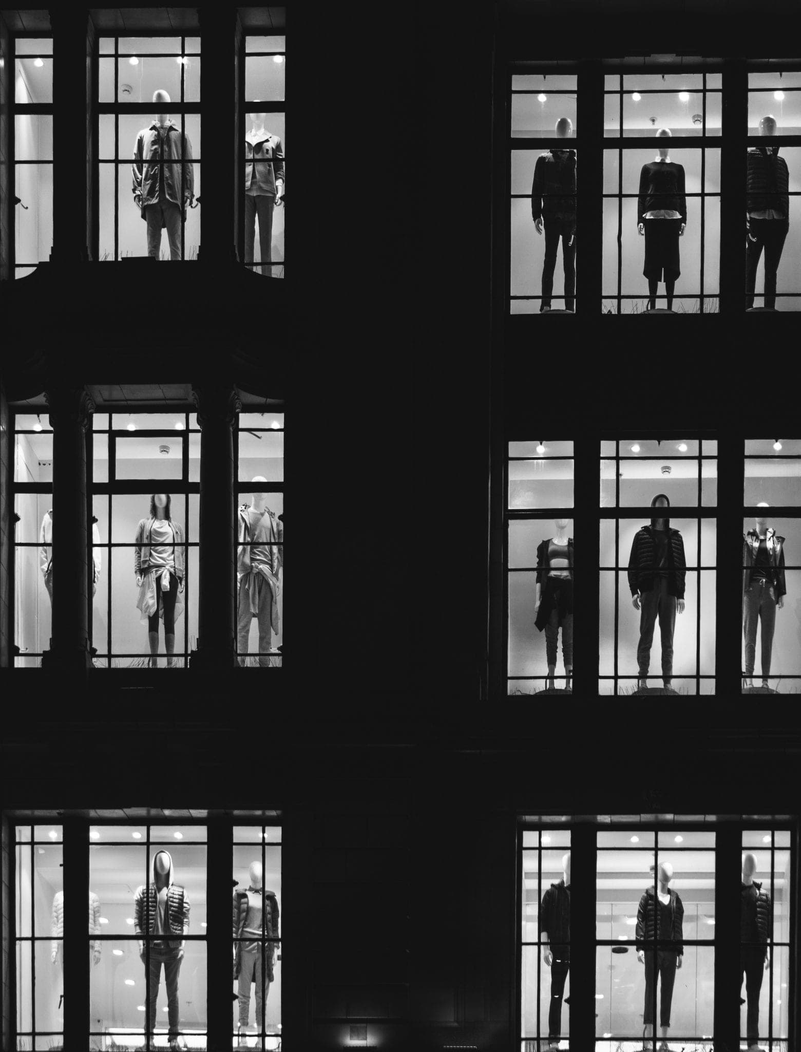 three levels of mannequins of a storefront