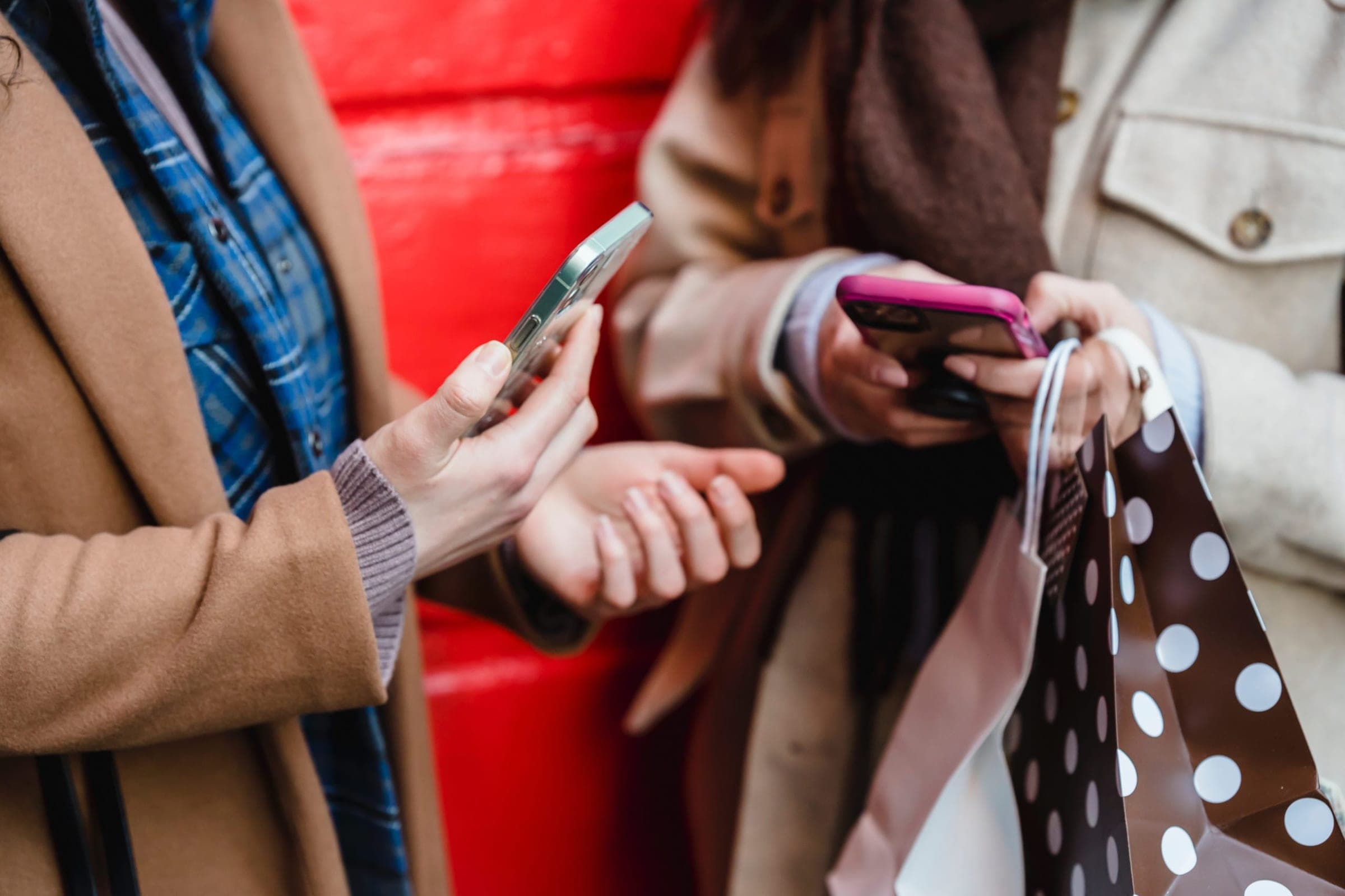 shoppers using consumer app on mobile phone