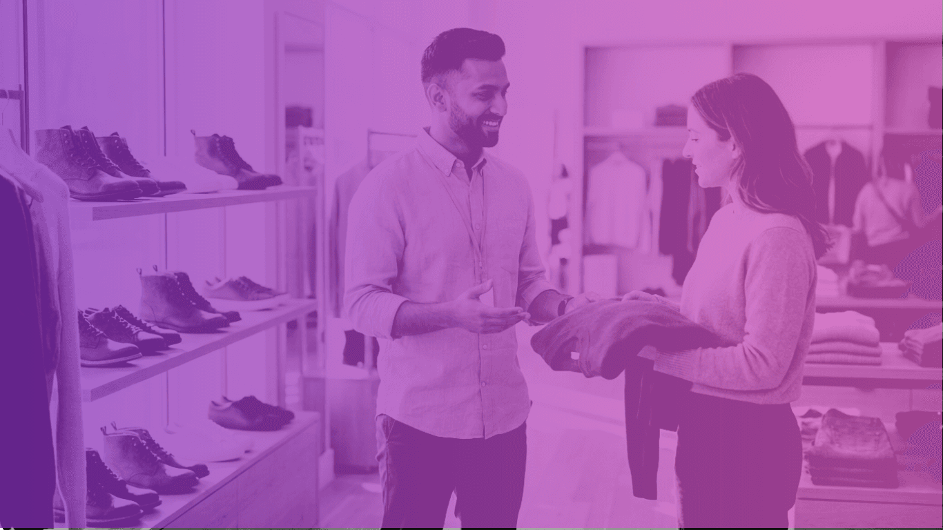 Store associate helping a customer, illustrating agentic AI in retail